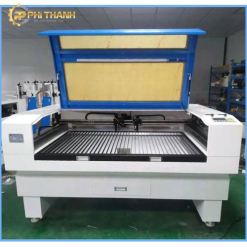 Máy cắt khắc laser hai đầu - chính hãng chất lượng cao cho sản xuất giày dép, giúp cắt và khắc chính xác trên các vật liệu như da, da PU, vải, EVA, cao su và nhiều vật liệu phi kim khác. Với hai đầu laser hoạt động đồng thời, thiết bị giúp tăng gấp đôi năng suất, giảm thời gian gia công và đảm bảo chất lượng thành phẩm đồng đều. Công nghệ laser CO2 hiện đại mang đến đường cắt sắc nét, không cháy cạnh, đáp ứng nhu cầu sản xuất từ quy mô vừa đến công nghiệp.